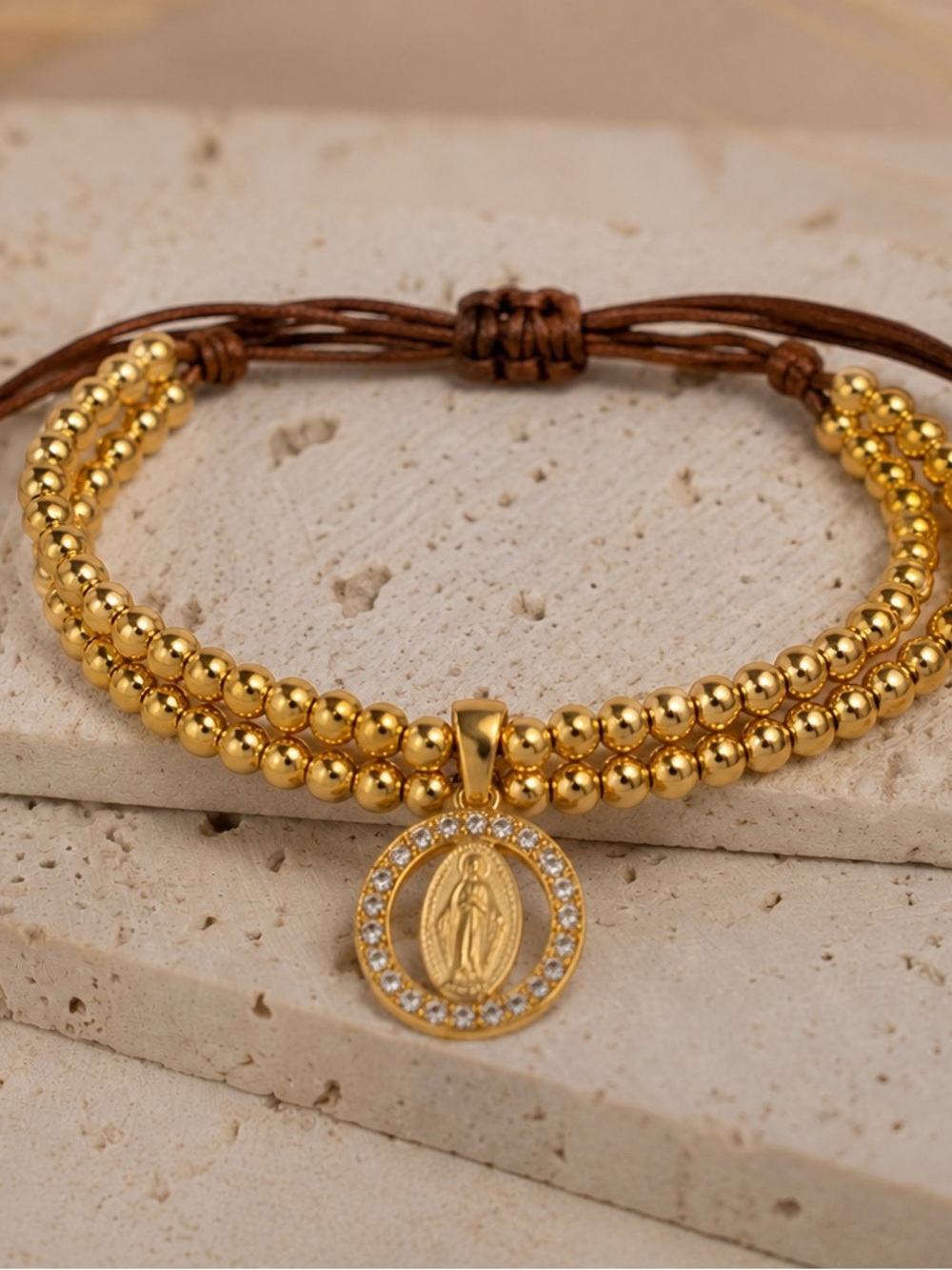 Gold-Tone Beaded Medal Bracelet with Crystal Accent
